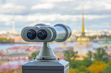 Wall Mural - Beautiful view to spires of Admiralty and Peter-Pavel's Fortress from Isaac cathedral in Binoculars, Saint Petersburg, Russia.