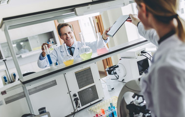Wall Mural - laboratory scientists working