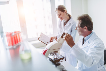 Wall Mural - laboratory scientists working