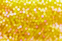 Gold Beads With Bokeh Abstract Light Backgrounds.