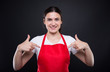 © Catalin Pop - Supermarket employee pointing fingers to herself