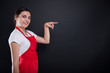 © Catalin Pop - Attractive girl seller pointing with finger