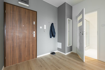 Entryway with wooden door