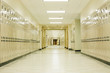 © Raymond Forbes LLC/Stocksy - Lockers in school corridor