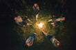 © realstock1 - The five people sit near the bonfire. view from above, evening night time