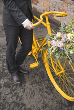 Groom With Yellow Bicycle