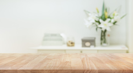 real wood table top texture on white wall room background.for create product display or key visual l