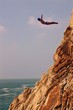 Acapulco coast. Divers diving from the rock. Mexico.