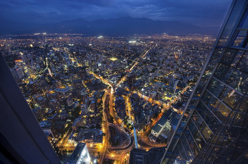 Fototapete - Panoramic city view from the Gran Torre Santiago in Santiago de Chile.