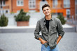 © F8  \ Suport Ukraine - Handsome smiling young man portrait. Cheerful man looking at camera