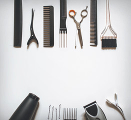 Barbershop concept.Hair stylist's accessories on a white background top view copy space. Hairdressing skill.