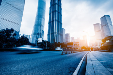 cars driving on inner city road of shanghai, china, asia.