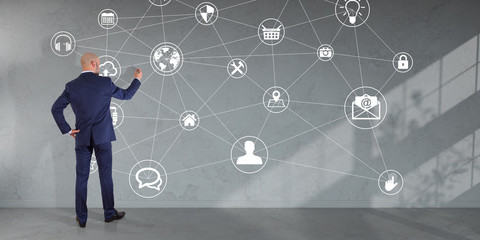 Poster - Businessman using social network interface on a wall 3D rendering