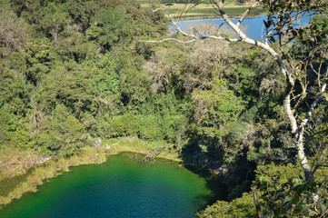 Wall Mural - Landscape near the archaeological site of Chinkultic with one of the lagunas of the Montebello National Park, Chiapas, Mexico