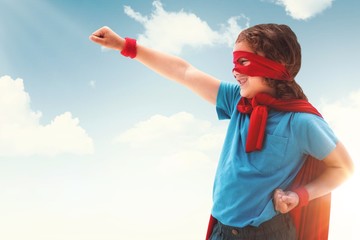 Wall Mural - Composite image of happy boy in red cape