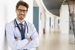 © Monkey Business - Portrait of young male doctor with stethoscope, close up