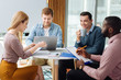 © zinkevych - Concentrated woman checking her colleagues