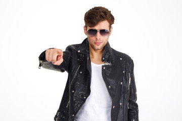 Wall Mural - Portrait of a man in a leather jacket and sunglasses