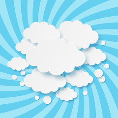 Wall Mural - Paper clouds on blue background