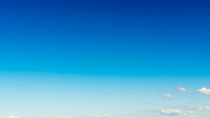 Time lapse clouds on blue sky
