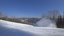 Professional Snowboarder Touching Snow With Hand, Made Nice Turns In On The Mountainside. Slow Motion