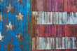 © alan shapiro/Stocksy - American Flag on distressed metal