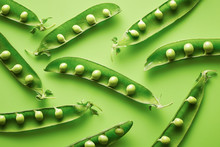 Pea Pods On Green Background