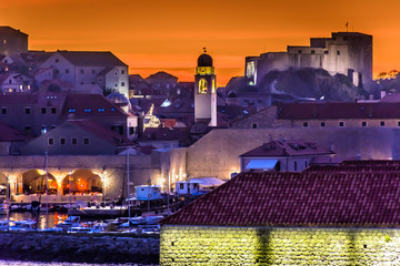 Wall Mural - Dubrovnik city sunset. / Sunset over medieval town Dubrovnik, famous tourist travel destination on Adriatic Sea, Croatia Europe.