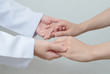© praisaeng - Doctor shakes hands with a patient.Helping Hands ,trust and relationship