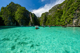 Fototapeta Uliczki - Beautiful crystal clear water at Pileh bay at Phi Phi island near Phuket, Thailand