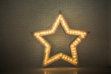 A star with a lighted lamp in the Interior