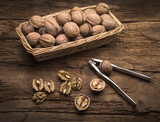 Fototapeta  - still life with walnut and nutcracker
