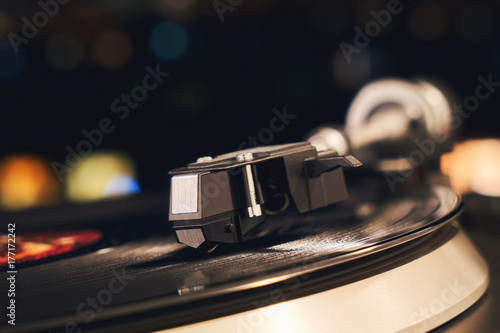 A Vinyl Record Close Up On A Dark Background Falling Beam Of Light On A Piece Of Vinyl Turntable Record Player Needle On The Plate Stock Photo Adobe Stock
