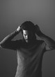 © BONNINSTUDIO/Stocksy - Portrait of attractive young man in black and white.
