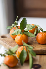 Clementines On Cutting Board
