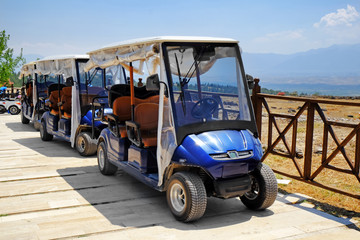 Poster - Modern buggies parked at resort