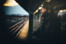 Scruffy Commuter Waits For The NYC Subway