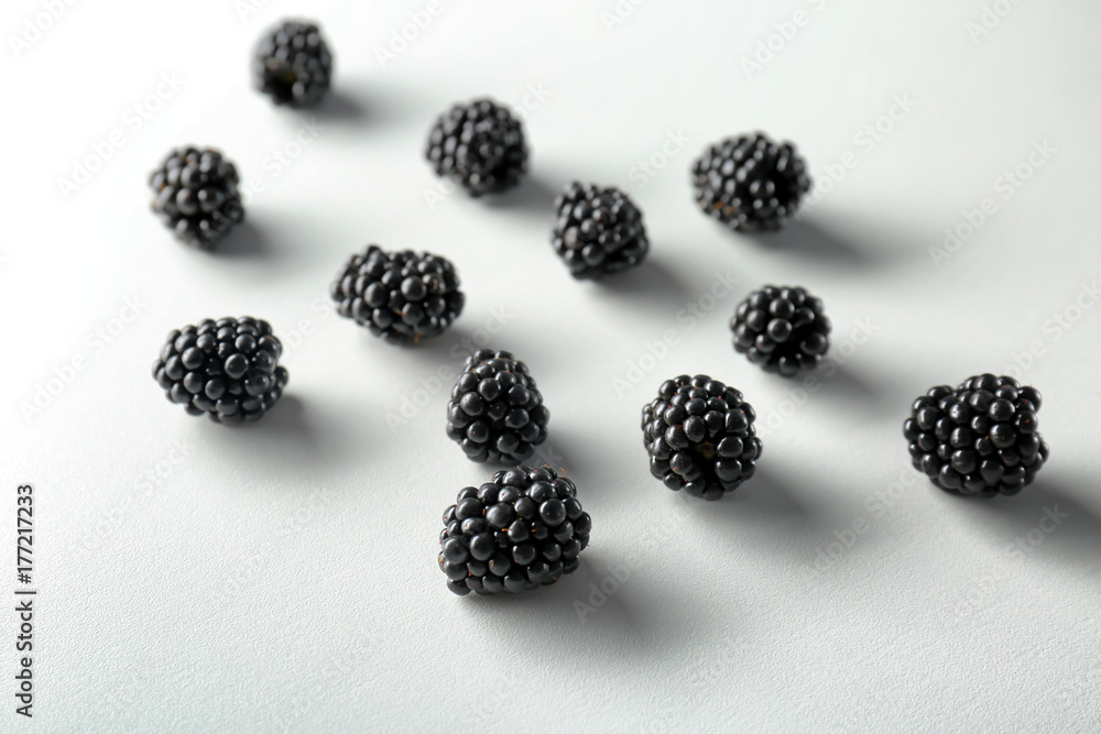 Delicious blackberries on white background