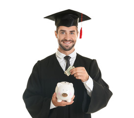 Sticker - Young graduate with piggy bank on white background