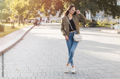 coat with t shirt and jeans