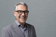 © stokkete - Smart businessman with glasses posing