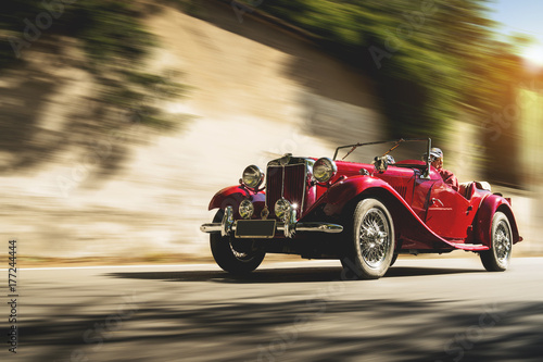 Εκτύπωση καμβά  Red vintage car at sunset