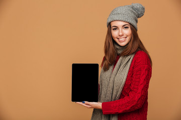 Poster - Smiling caucasian lady showing display of tablet computer.