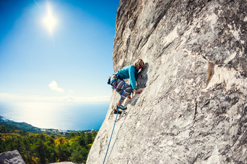 A rock climber on a wall.