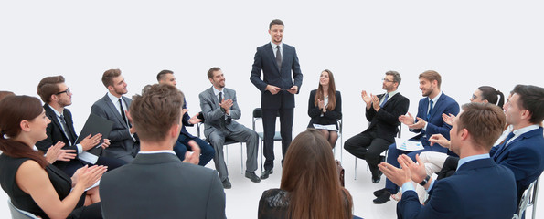 business group greets leader with clapping and smiling