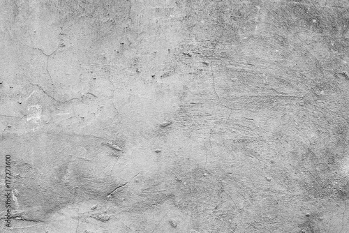 Wall fragment with scratches and cracks