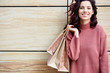 Beautiful young woman with shopping bags