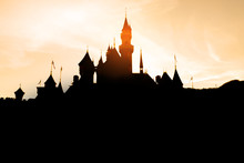 Silhouette Of Castle With Sunset Sky.
