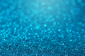 Blue bright glitter bokeh background. Sparkle texture for birthday card or christmas, new year, valentine's day, party and other holidays invitation.