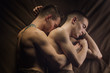 © Igor Madjinca/Stocksy - gay tattooed couple in bed, sleeping